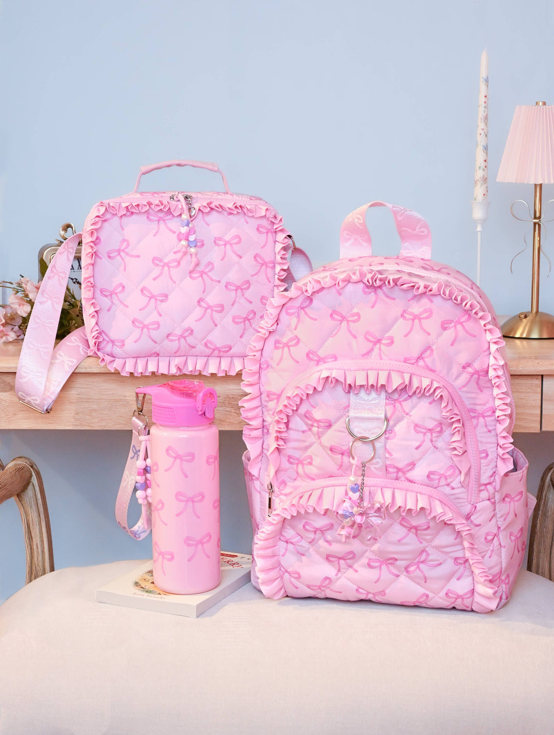 BOW PRINTED RUFFLE QUILTED LARGE BACKPACK