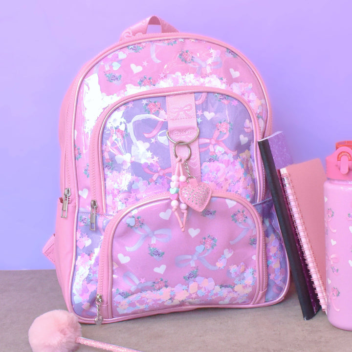 BOW CONFETTI LARGE BACKPACK WITH HEART CHARM