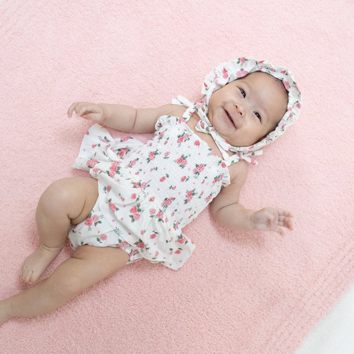 SMOCKED BUBBLE W/ SKIRT | PINK ROSETTES